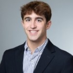 Nicholas E.